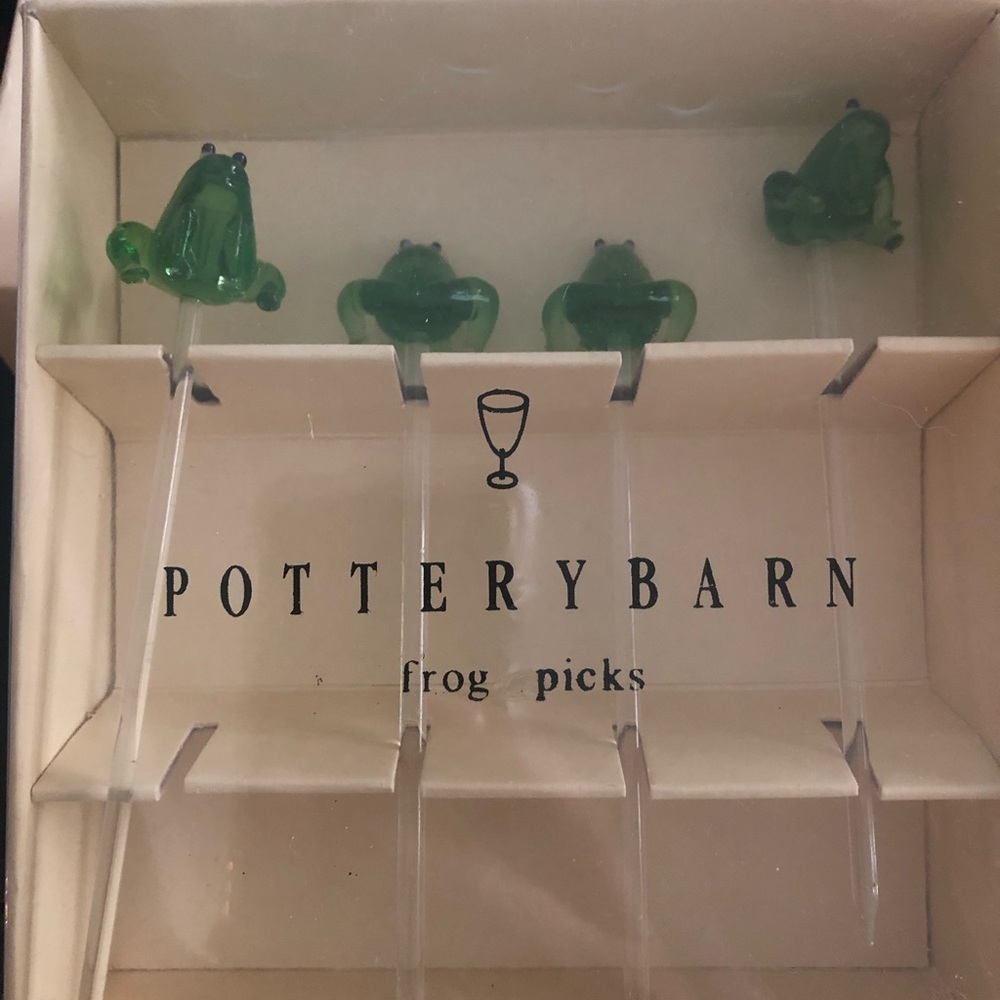 Never used. Set of 4 frog drink picks.